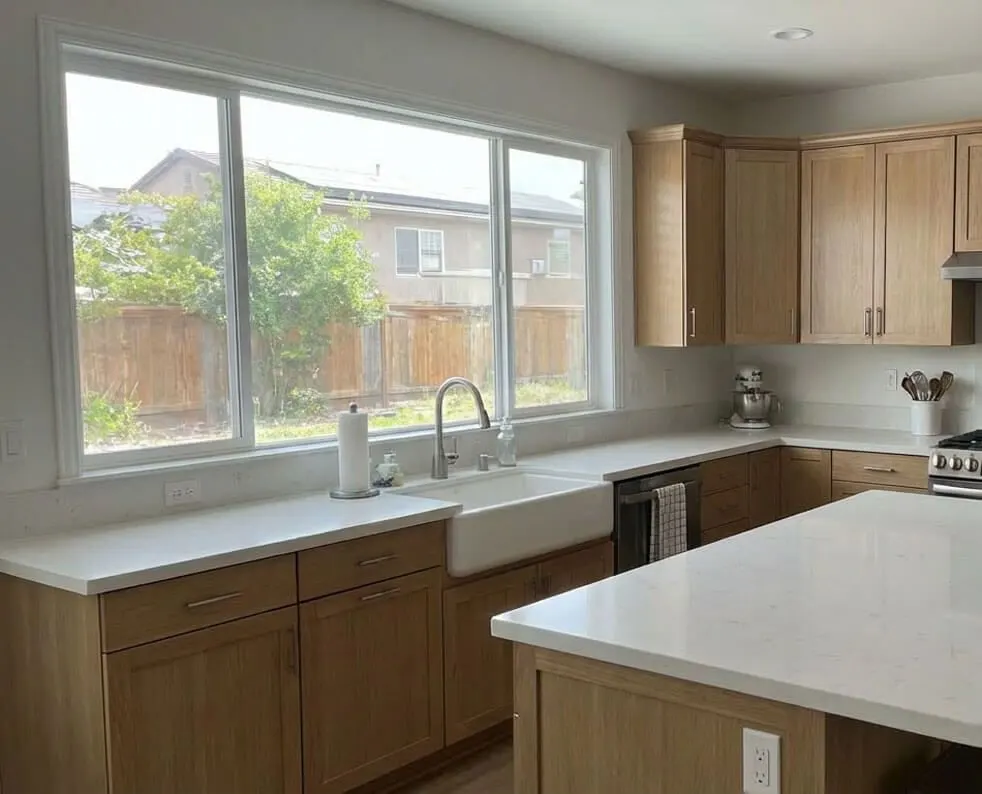 Window over the kitchen sink with no shutters yet