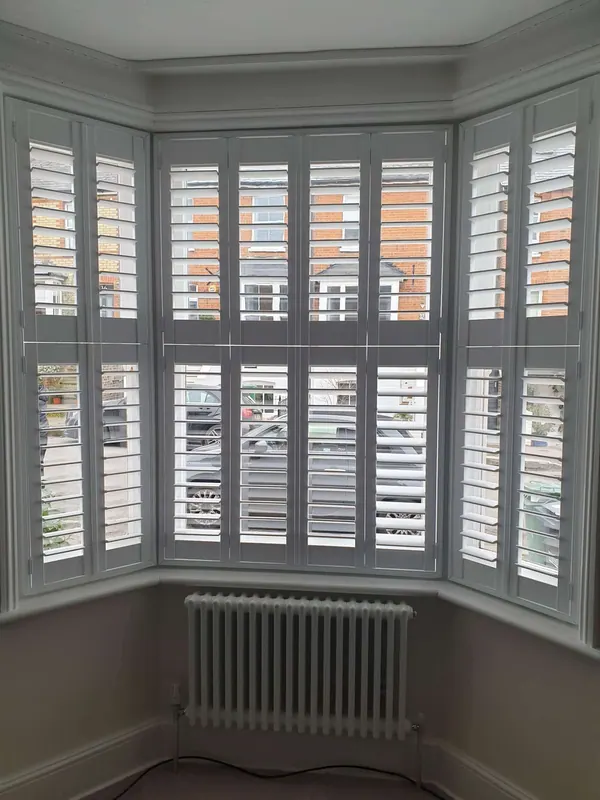 Plantation shutters, the picture for our article Enhance Your Home’s Elegance with Tier-on-Tier Window Shutters: A Comprehensive Guide