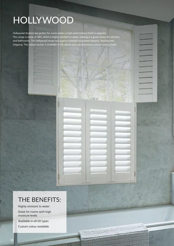 Bathroom window fitted with Hollywood shutters