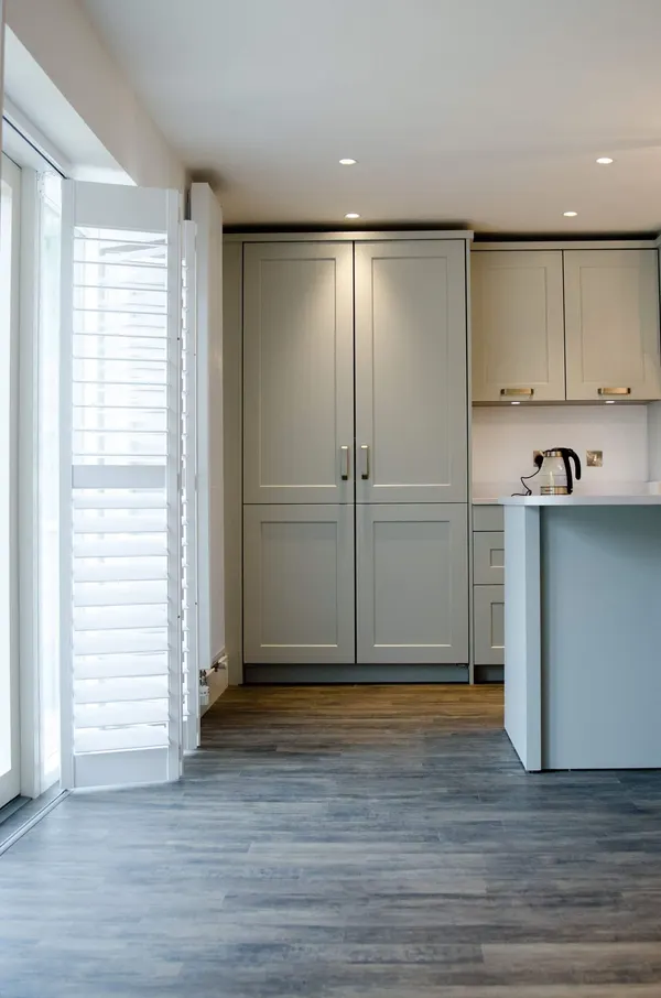 Kitchen door with bi-fold shutters folded to one side