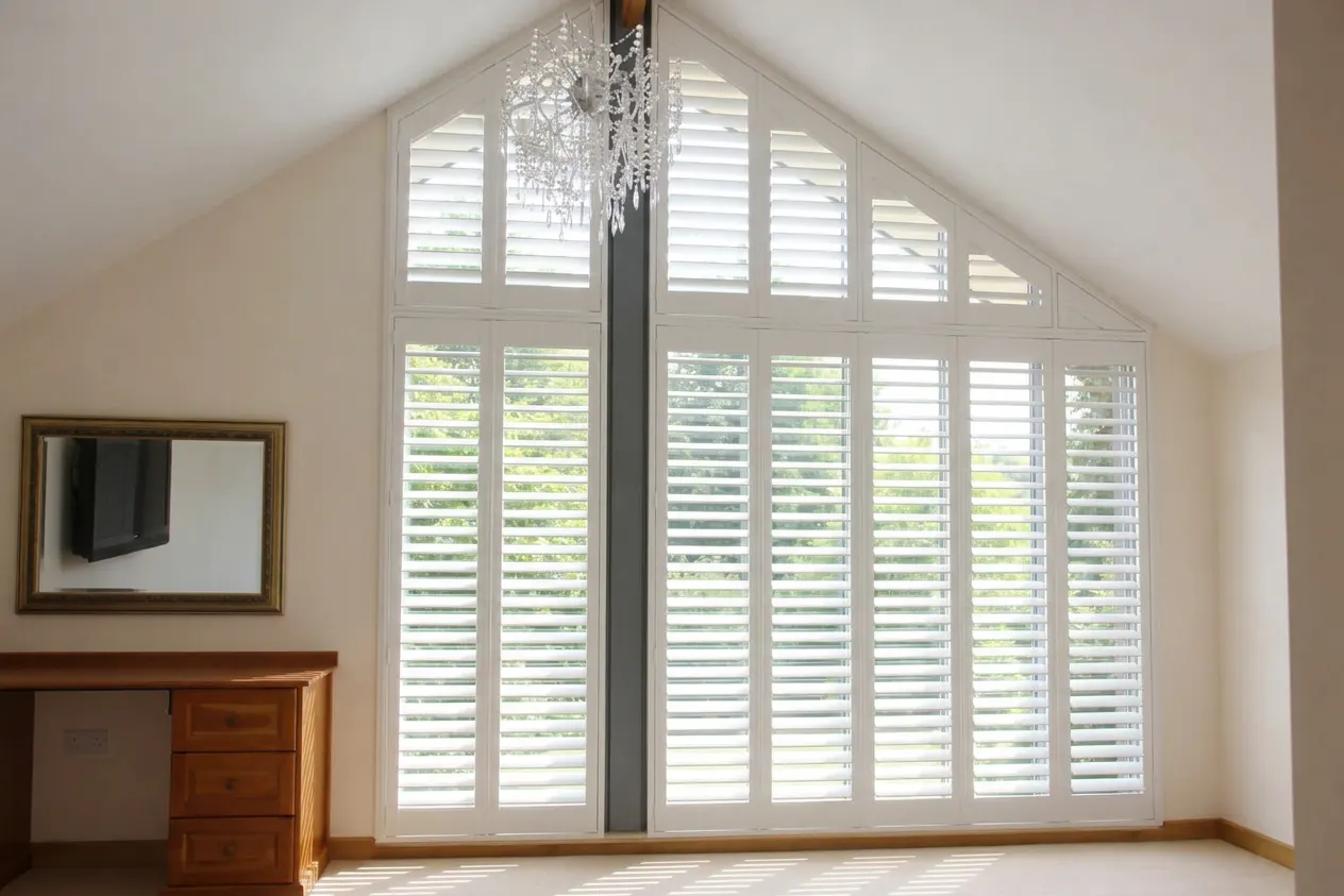 That gable window again, with white plantation shutters drawn in by the AI preview